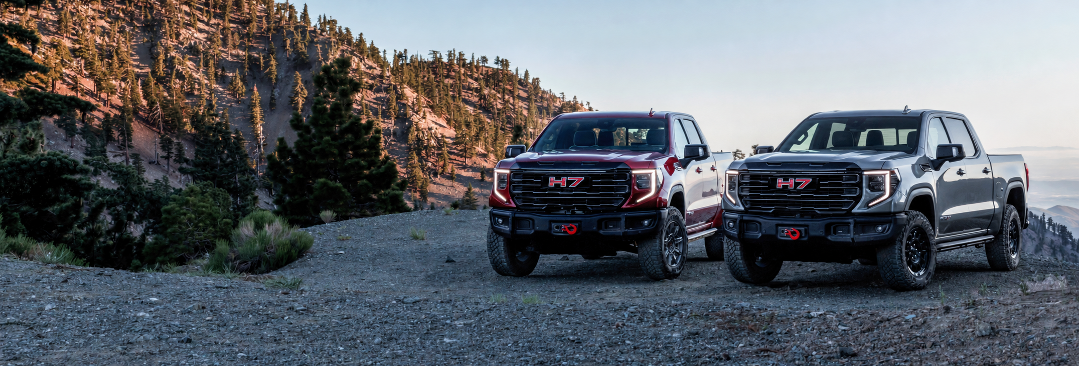 Two H7 vehicles in the mountains